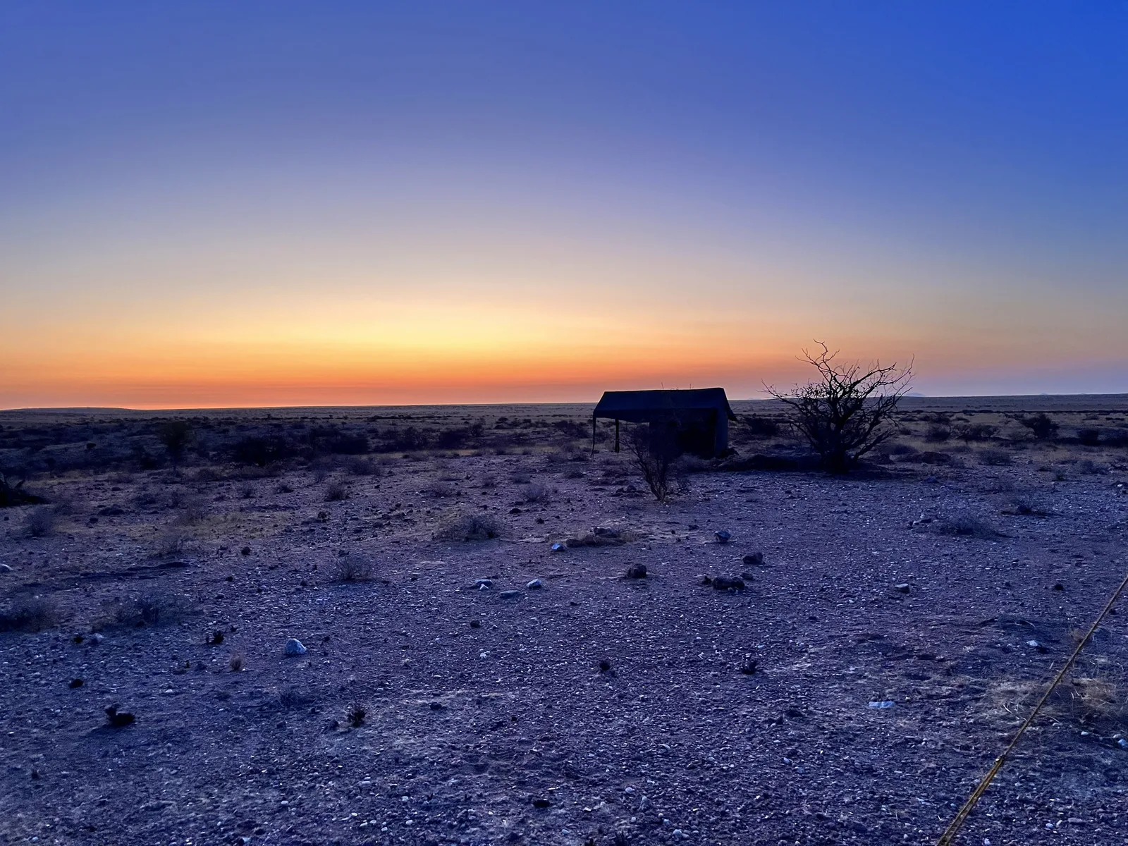 A comfortable mobile safari tent at sunset on the Sorris Sorris hiking route.